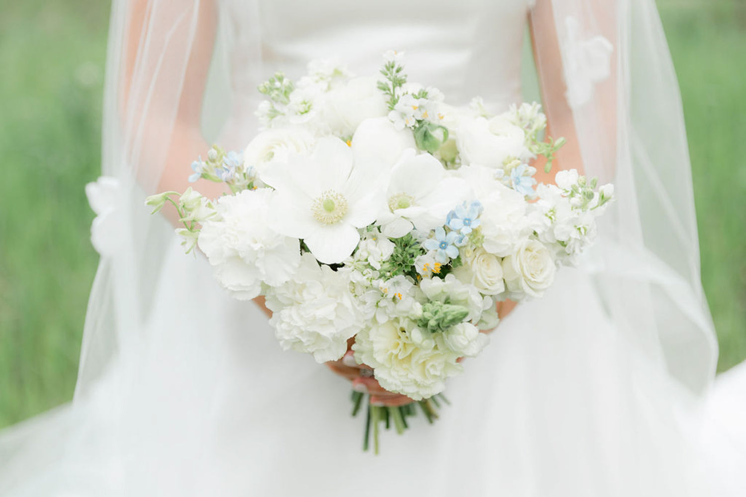 June blue and white wedding bouquet at Jackson Hole Golf and Tennis